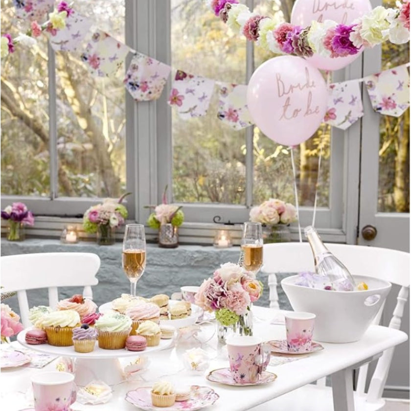tea party scene in pink florals with blossom girls vintage floral bunting