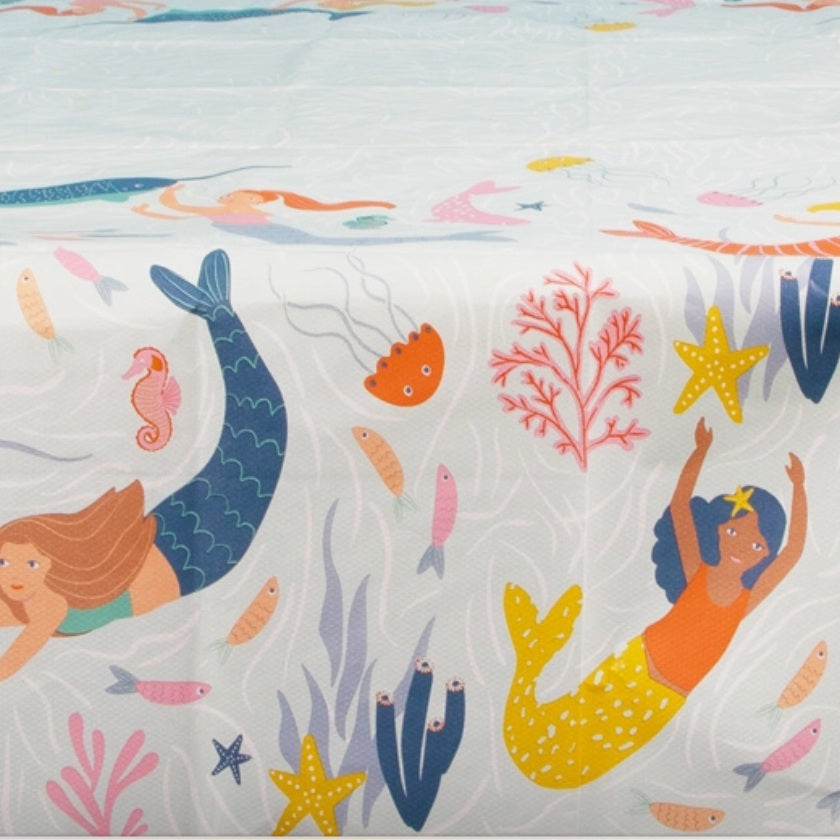 Fully recyclable multi-coloured Mermaid tablecloth & packaging featuring mermaids, fish, coral and starfish.