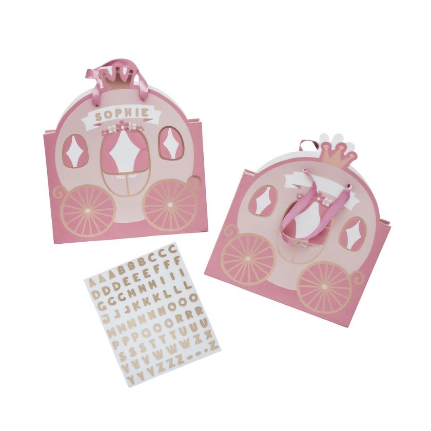 Customisable pink princess party bags in shape of princess carriage with sticker sheets for personalisation.