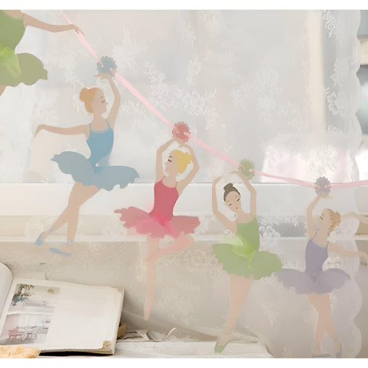 Ballerina paper Garland with Ballerinas in blue, pink, green and lilac tutus strung on pink ribbon