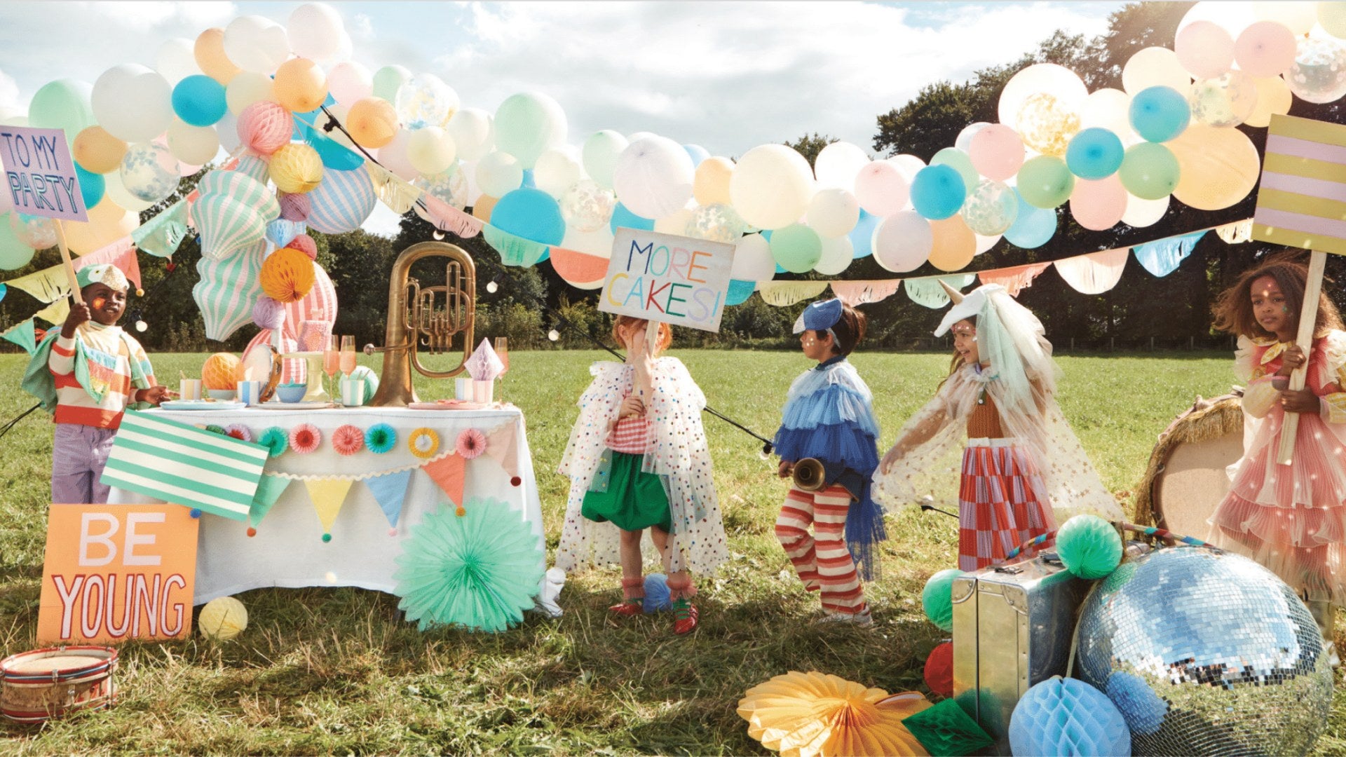 Children's Party Scene with party table and balloons