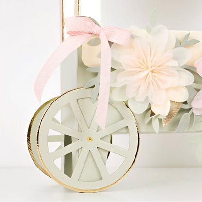 Beautiful Laduree Macaron Cart Centrepiece in mint with pink ,peach & ivory paper tissue  flowers already strung. Cart wheels and cart have gold foil detail