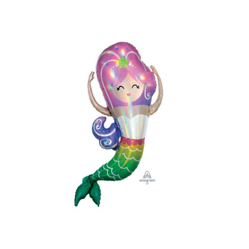 A foil balloon shaped like a mermaid with pink hair and a rainbow-colored tail