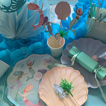 Stunning Mermaid Tablescape with Mermaid plates, Mermaid cake toppers and Mermaid decorations