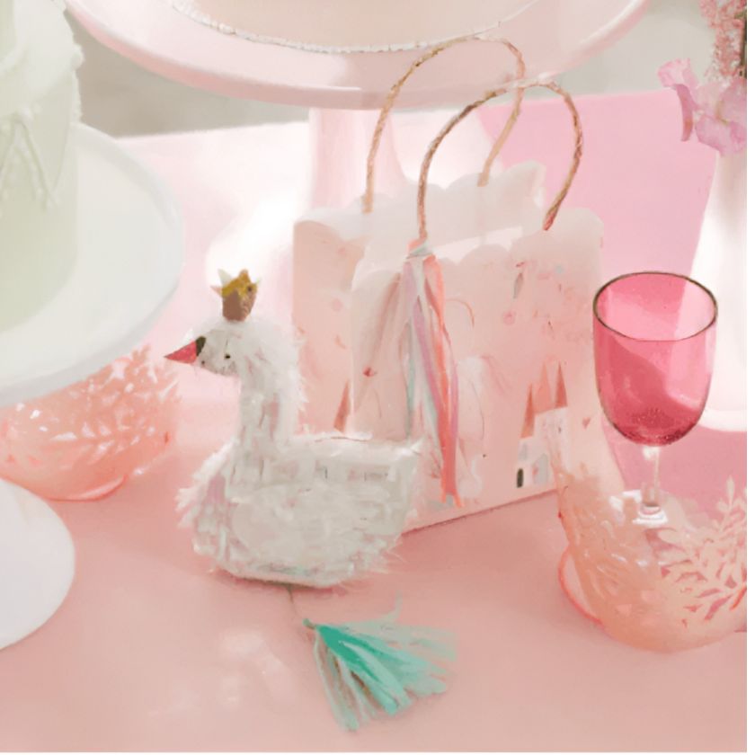 Lovely Princess Table setting with swan pinata and princess party bag