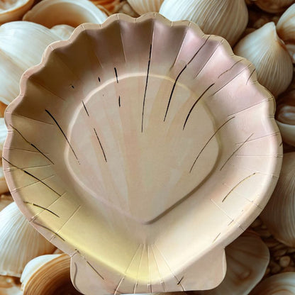 paper clam shell party plate on bed of shells