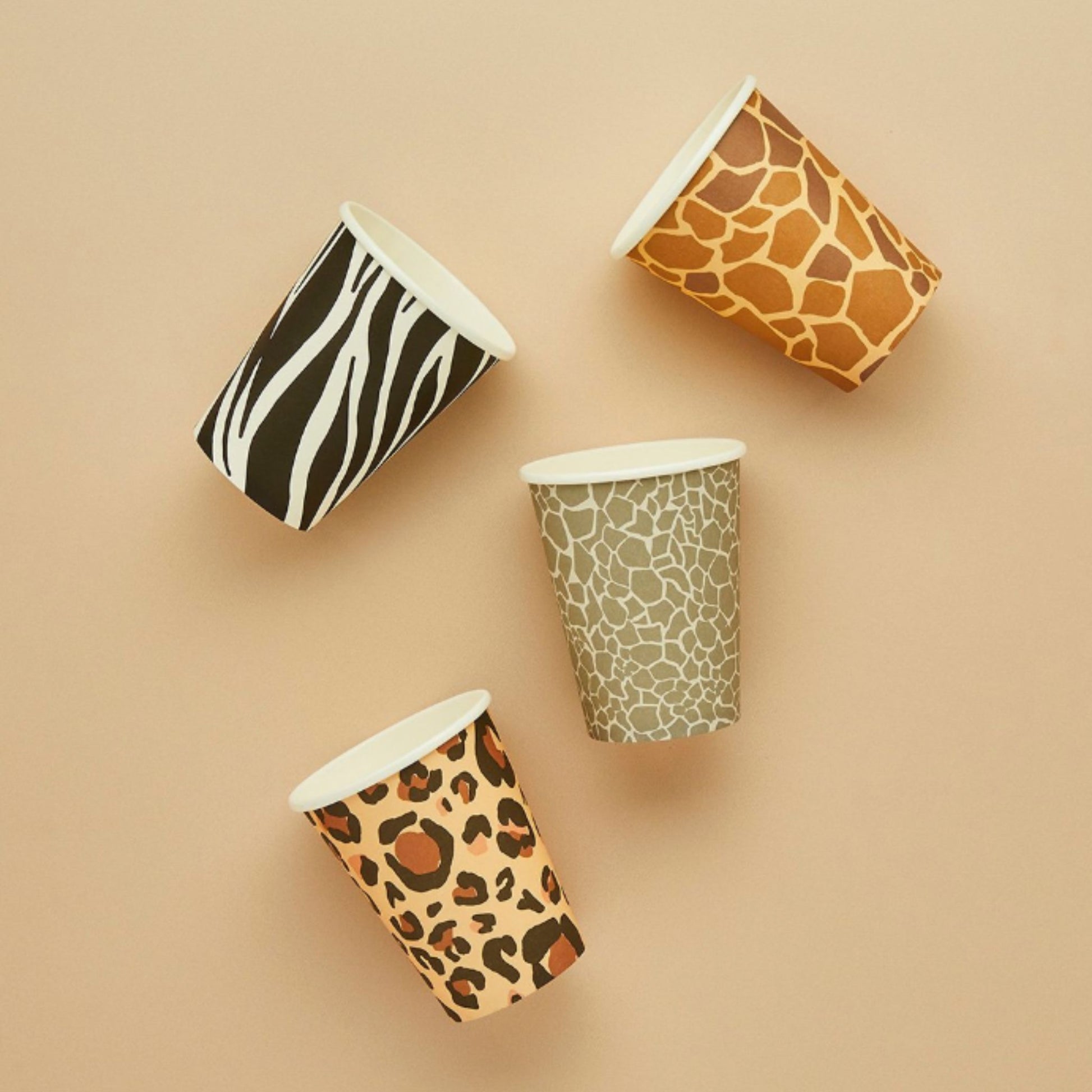 Animal print paper party cups in 4 designs. Leopard, Giraffe , Zebra & Cheetah 
